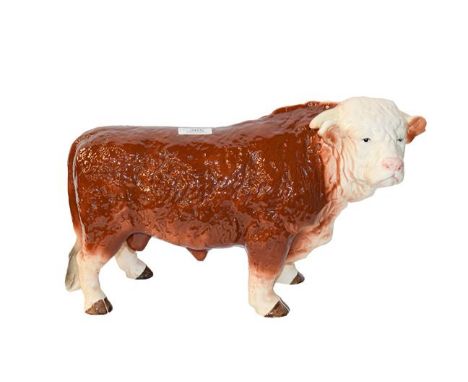 A large Melba ware bull and a model of a Highland cow (2)