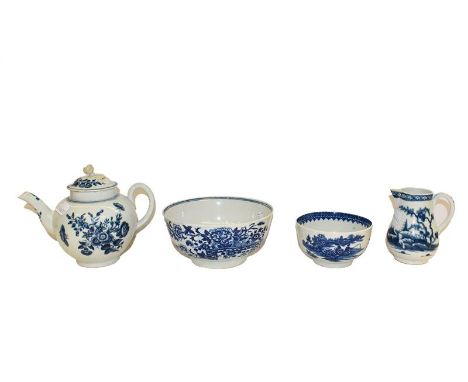 A collection of 18th century blue and white Worcester porcelain, a teapot in Three Flowers pattern, a sparrow beak jug in the