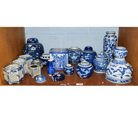 A selection of blue and white Chinese porcelain including ginger jars and covers, small floral and dragon decorated vases, et
