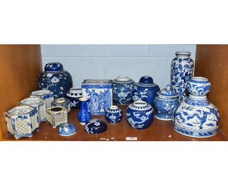 A selection of blue and white Chinese porcelain including ginger jars and covers, small floral and dragon decorated vases, et