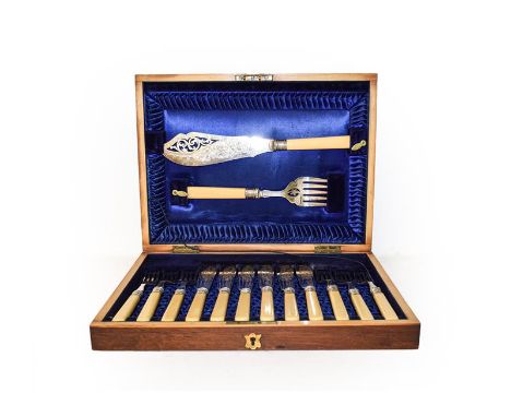 A quantity of silver plate including a cased set of fish knives and forks, Georgian tea caddy of ovoid form, muffin dish and 