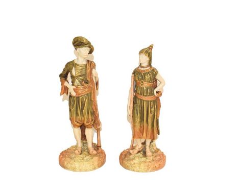A pair of Royal Worcester figures modelled as Bringaree Indians, date code 1887, 23cm high  .  Good condition. No damage or r