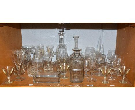 A quantity of 19th century and later glassware including a decanter inscribed Scotch Whiskey, a pair of heavy tumblers, cigar