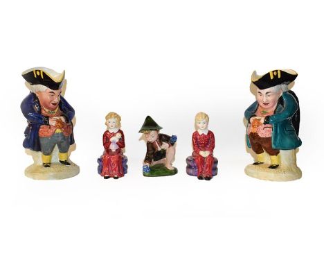A tray of mixed ceramics including Royal Worcester flat back jug, a pair of paragon figures of David and Carole, Goebel figur