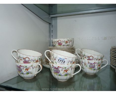 A Royal Worcester 'Pekin' teaset, to include six cups and saucers, six plates and a cake plate.