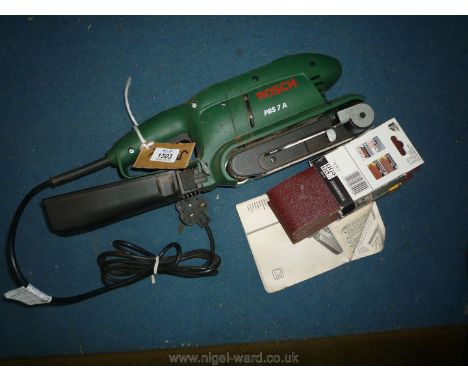 A Bosch PBS 7A 600 w 230 v Belt Sander with Bosch Micro Filter System and spare belts.