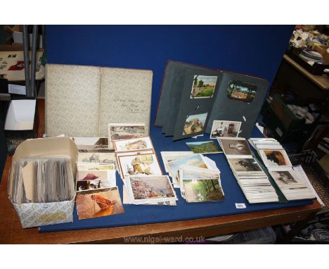 A quantity of Postcards and three albums, (one album of portrait sittings, another album dated 15th August 1905 and the other