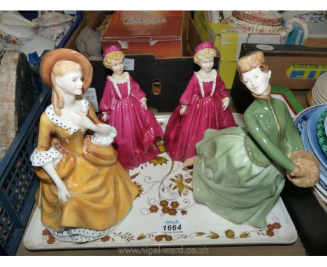 Two Royal Doulton figures; 'Grace' and 'Sandra', together with two Royal Worcester figures of 'Grandmother's dress'.