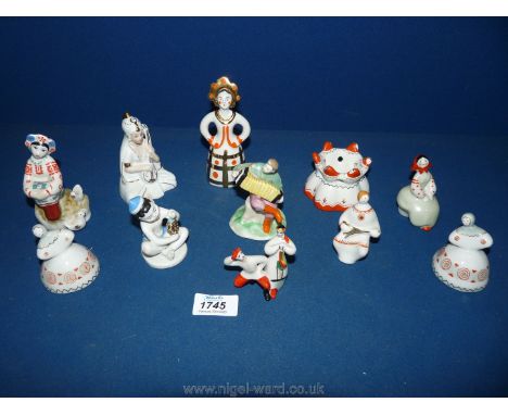 A collection of small Russian dancers, lute player etc.