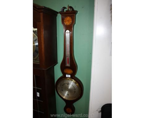 A good 19th c. Mahogany Barometer and thermometer having lightwood strung case and with two shaded inlaid roundels and shell 