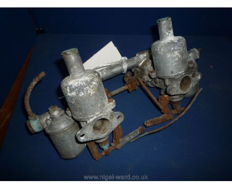 A pair of SU H1 1 1/8" Twin Carburettors with aluminium inlet manifold incorporating a balancing tube, aligning dowels, vacuu