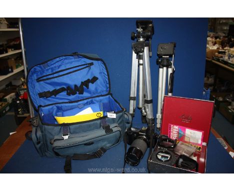 An Olympus Om101 power focus SLR Camera with lenses including 70-120mm, 28-70mm and 50mm along with instructions, Jessops cam