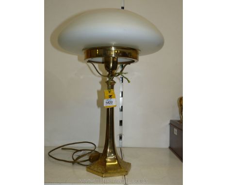 A Brass table Lamp with domed Art Nouveau style glass shade.