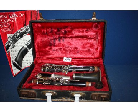 A cased Corton Clarinet.