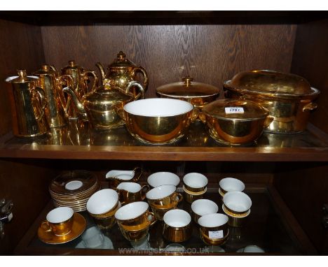 A quantity of Royal Worcester Gold lustre china to include teapot, coffee pot, hot water pot, cups and saucers etc.