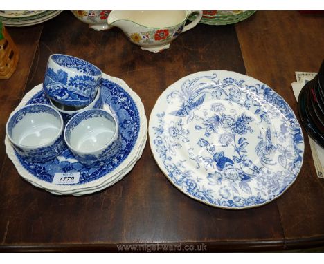 A large Royal Worcester plate, four Mason's plates and four ramekins, all blue/white.