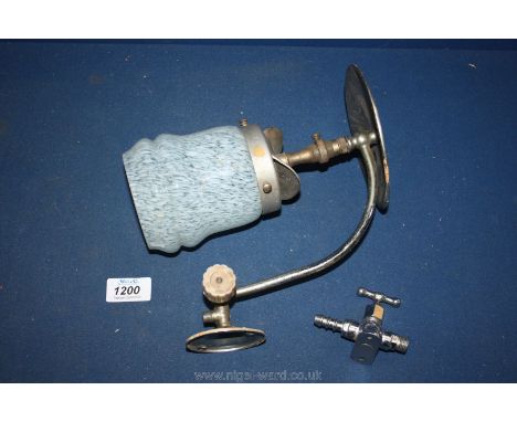 A gas Light fitting complete with burner and glass shade and a chrome gas valve/tap.