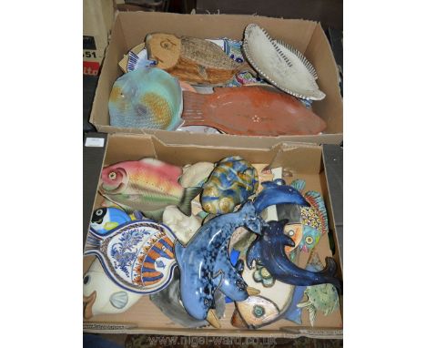 Two boxes of ceramic fish, etc.