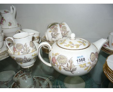 A Wedgwood 'Lichfield' part Teaset comprising teapot, milk jug, sugar bowl, five cups and saucers and six plates.