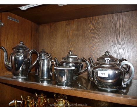 A quantity of Royal Worcester Silver lustre china to include three teapots, two coffee pots, sugar and milk jug.