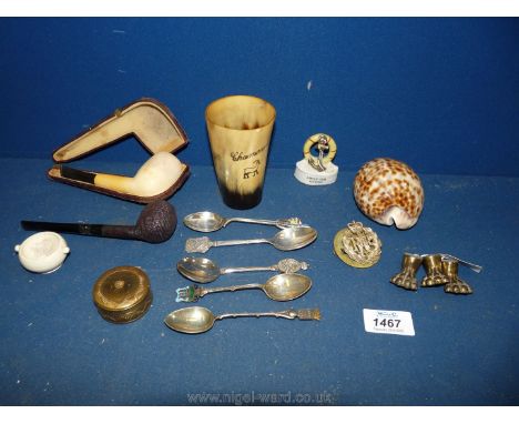 A quantity of miscellanea to include a horn beaker, three small brass lions feet, a cased pipe plus another etc.