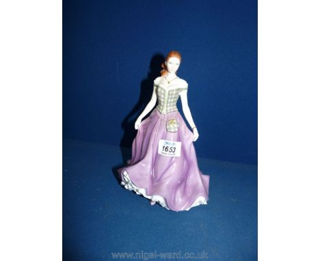 A Royal Worcester ''Ladies of Isle - Heather'' figure, dated 2003, boxed.