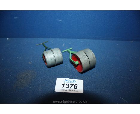 A Triang Spot-On lawn roller and a Dinky lawn roller.