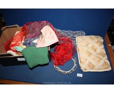 A quantity of miscellaneous vintage fabrics and a vintage wedding tiara.