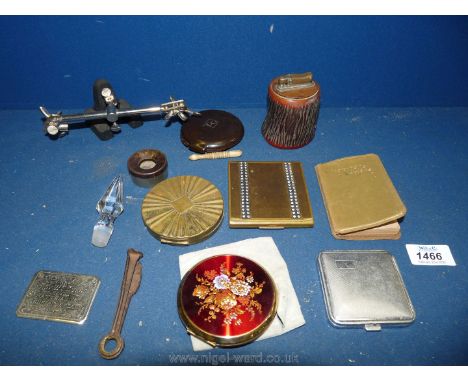 Five powder compacts including two Stratton, one Max Factor and a vintage 3 in 1 metal pipe cleaning tool and a helping hand 
