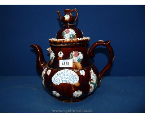 A large Bargeware Teapot marked 'A present from Mr E. Booth to J. Hancox, 1907', with teapot finial to lid, 11 1/2" tall over