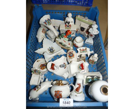 A quantity of Goss commemorative china including fire places, old gramophone, rocking chair, light house, ash tray etc.