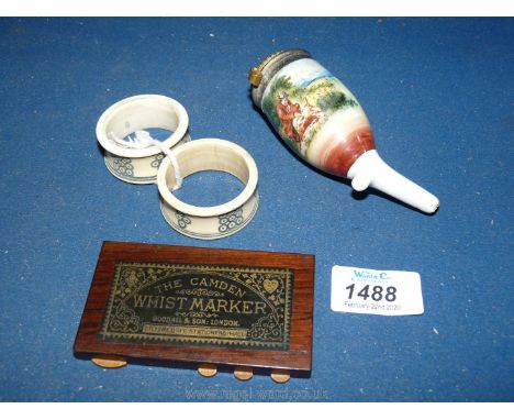 Two serviette rings, 'The Camden Whist Marker' and a china pipe