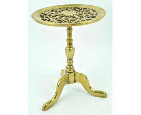 A19th century  brass trivet, in the form of a tripod table with pierced top, 30cm high x 22cm diameter