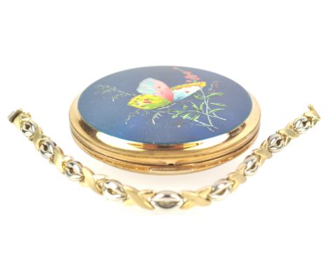 A ladies 9ct yellow gold bracelet, consisting of alternate brushed yellow gold 'X' links and polished white gold open navette