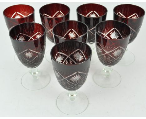 A set of eight Bohemian ruby flash and cut glass wine glasses, 14.5cm high