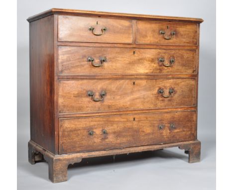 A George III mahogany chest of two short and three long drawers, on bracket feet, 101cm high x 110cm wide x 53cm deep