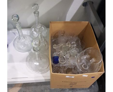 Four decanters, assorted glassware and decanter stoppers