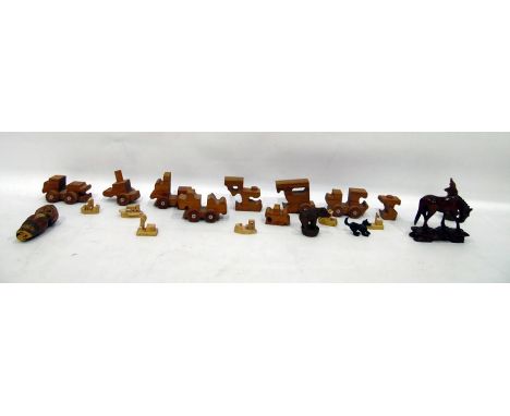 Assorted miscellaneous treen ware to include carved  wood bottle stopper, the finial carved as laughing figure, wooden train 