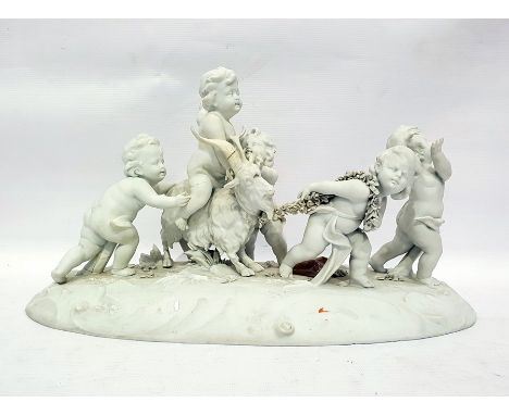 19th century Volkstedt bisque figure group of cherubs/nymphs in procession, including goat being pulled by flower garland, on