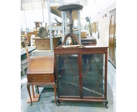 Georgian style glazed mahogany display cabinet, the pair of astragal glazed panelled doors enclosing glass shelves, raised on