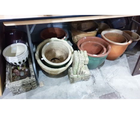 Large quantity of assorted planters to include terracotta examples, composite stone trough, etc 