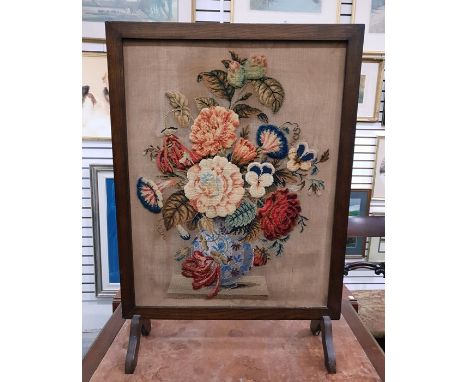 Victorian wool and beadwork floral tapestry panel within an oak frame stand, 82cm x 58cm 