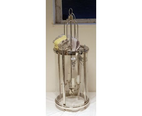 Four-light hanging metal lantern of circular form, height 93cm (VAT payable on hammer) 