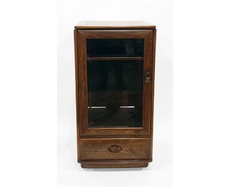 Ercol Furniture glazed cabinet, the panelled door enclosing shelf with drawer below, width 50cm 