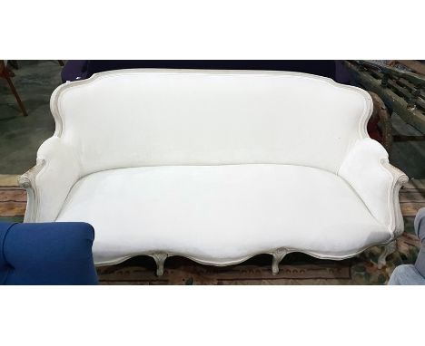 French style curved-back sofa with padded shoulder arms and on moulded cabriole shaped supports 