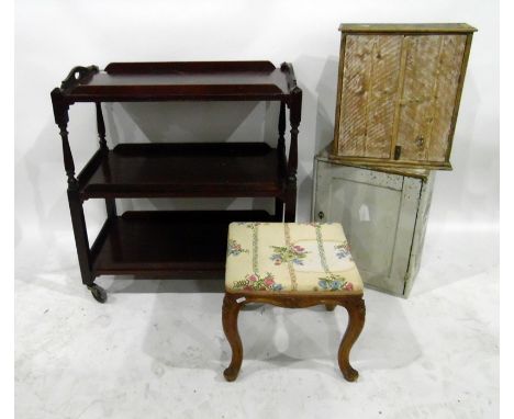 Two painted small wall cupboards, a walnut stool with upholstered top and cabriole legs and a mahogany three-shelf tea trolle