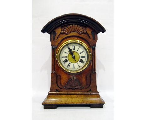 Late 19th century walnut cased German, "Junghans" mantel clock with enamel dial and striking movement, height 33cm 