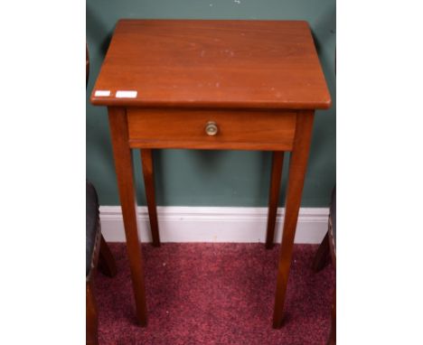 A MAHOGANY LAMP OR BEDSIDE TABLE, with rectangular top and frieze drawer, raised on square tapering legs, 18" (46cm) wide. (1