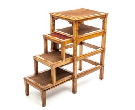 A LATE 19TH CENTURY OAK GOTHIC REVIVAL LIBRARY STEPS, with a pull-out three step section, on square supports, the larger sect