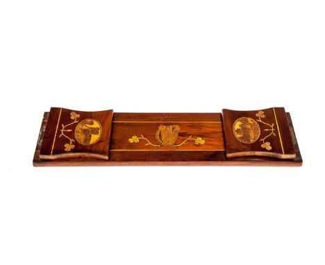 A FINE 19TH CENTURY KILLARNEY YEW WOOD AND MARQUETRY BOOK STAND, the top inlaid with a harp and shamrock sprays, the folding 